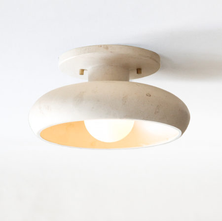 lit modern stone ceiling semi-flush mount light fixture in travertine marble and a tala bulb.