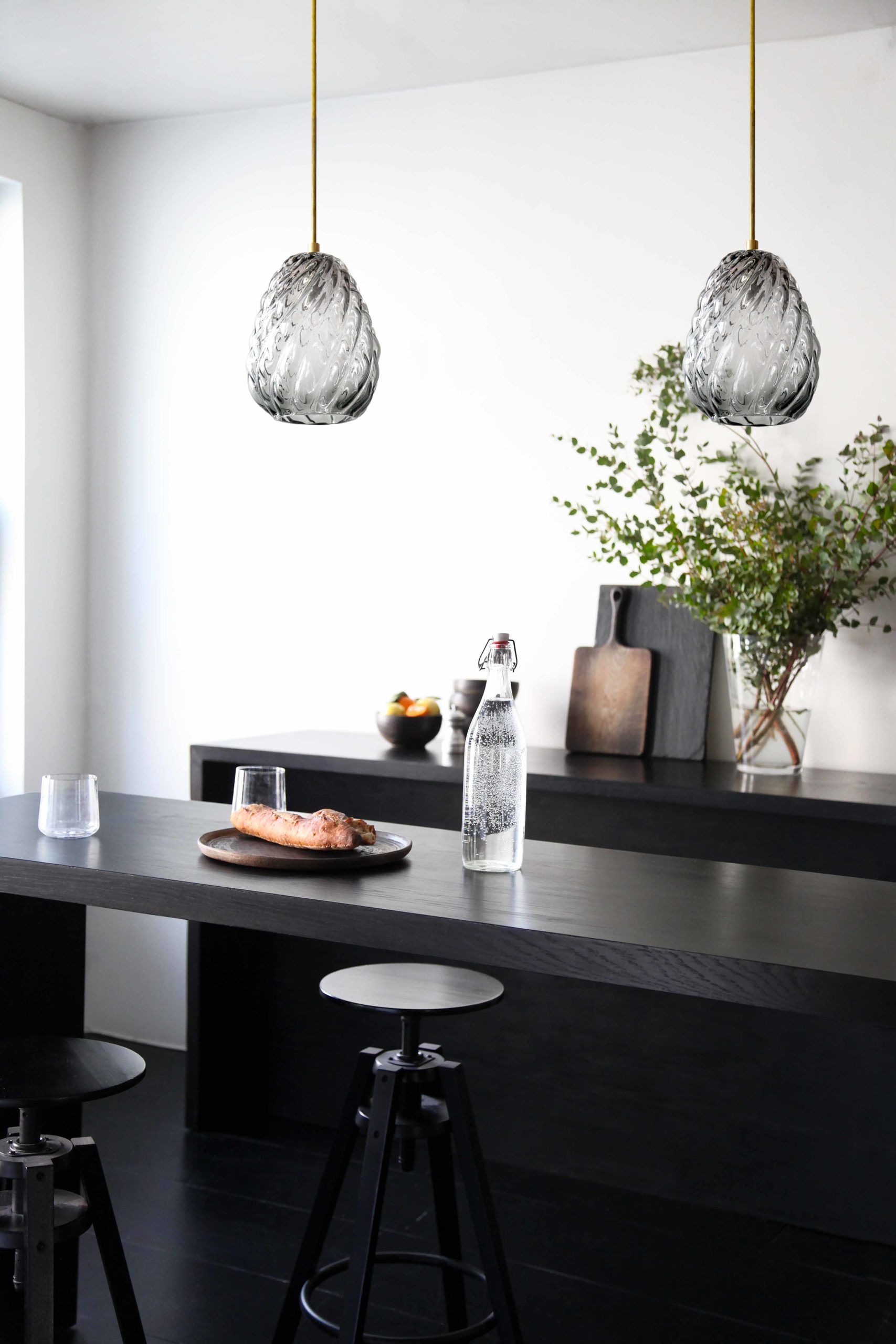 studio-kitchen_agave_tobala2 glass pendant lights over modern kitchen island counter.