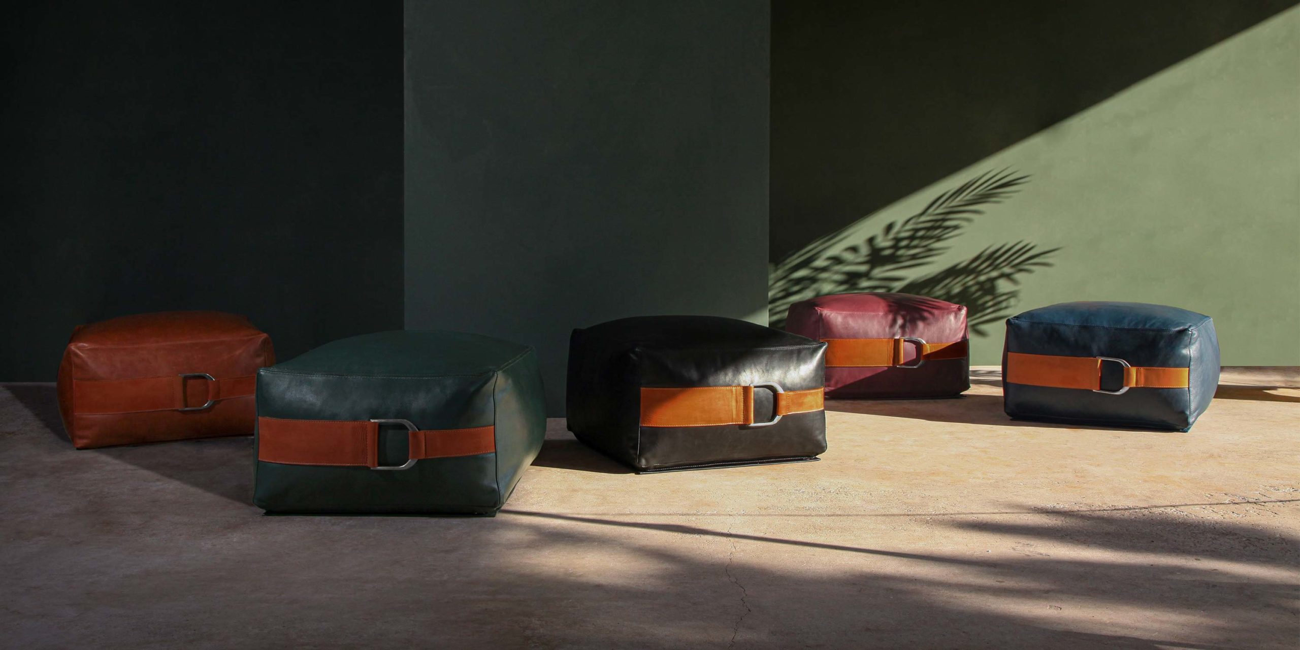 Talabartero-Leather-Collection_Poufs Talabartero Leather Collection, jewel tone leather poufs and bolster throw pillows