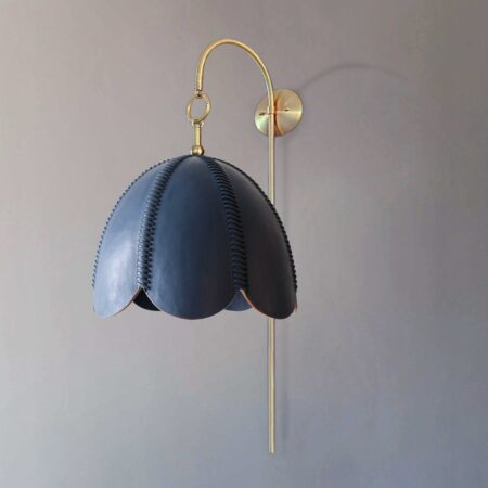 <a href="https://www.lavivahome.mom/lighting/talabartero-collection-saddle-lamps/">Saddle Lamps</a><br /><span style="font-size:9pt;" > Doma Arched Sconce</span>